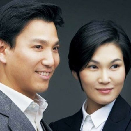 Lee and Kim smiling towards camera